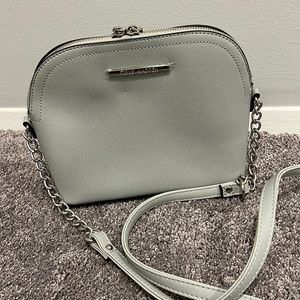 Steve Madden Crossbody Bag with adjustable strap. Still has plastic on hardware